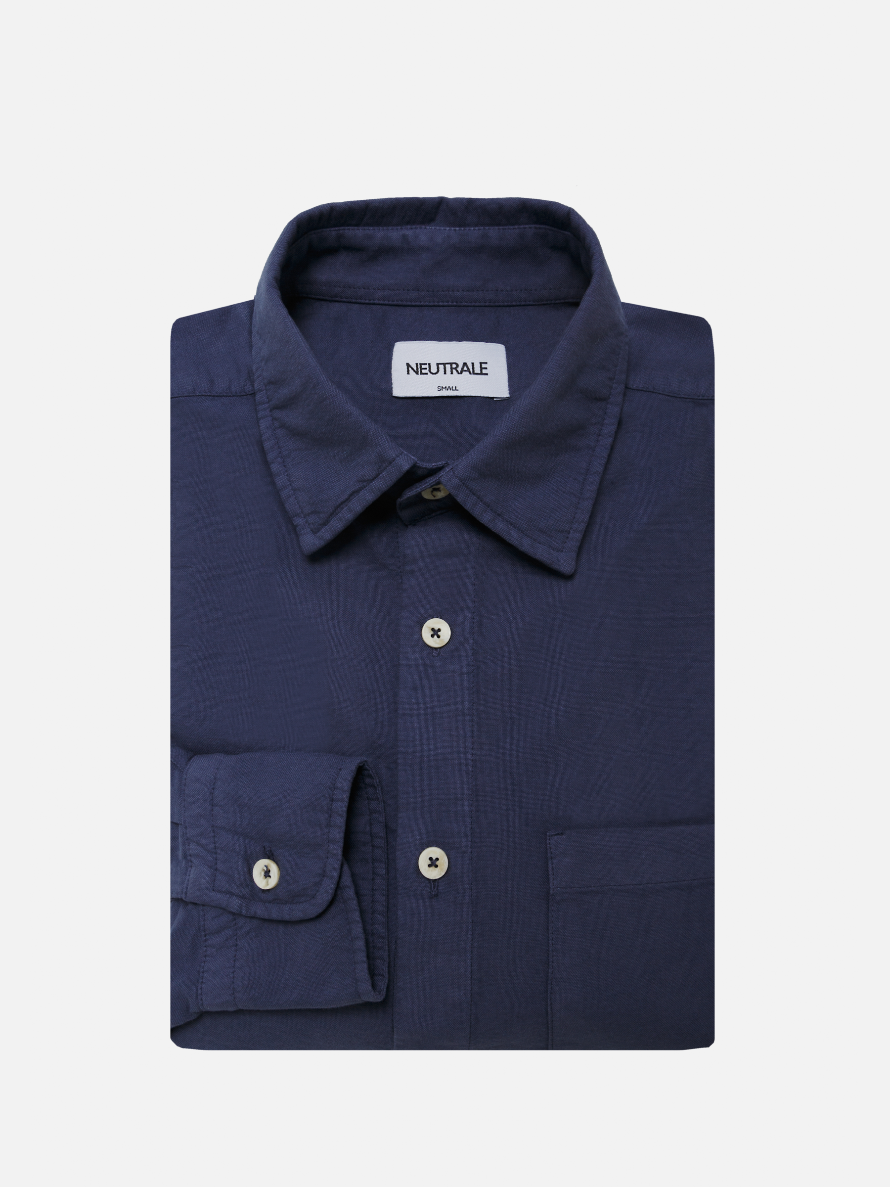 French navy unisex overshirt & loose-fitting with a classic button-down front and round hem. Crafted from 100% certified organic cotton.