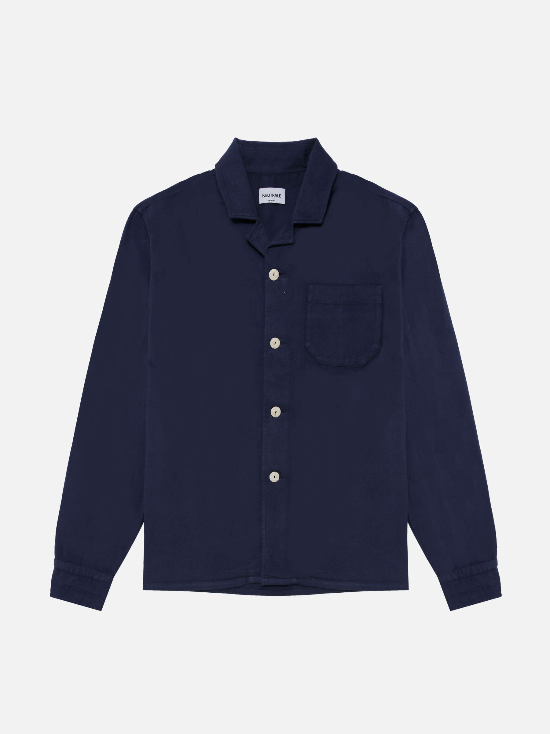 French navy unisex overshirt & loose-fitting with a classic button-down front and round hem. Crafted from 100% certified organic cotton.